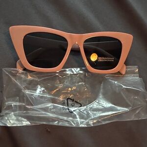 Chic Pink Sunglasses with Ultraviolet Protection